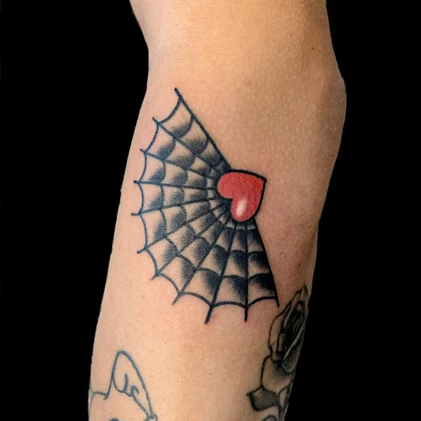 Half spider web tattoo