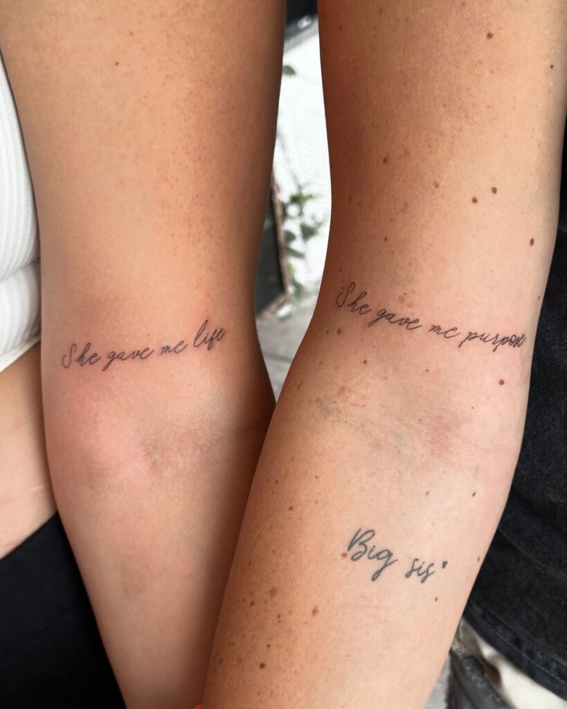 Heartfelt matching mother and daughter script tattoos with sentimental messages