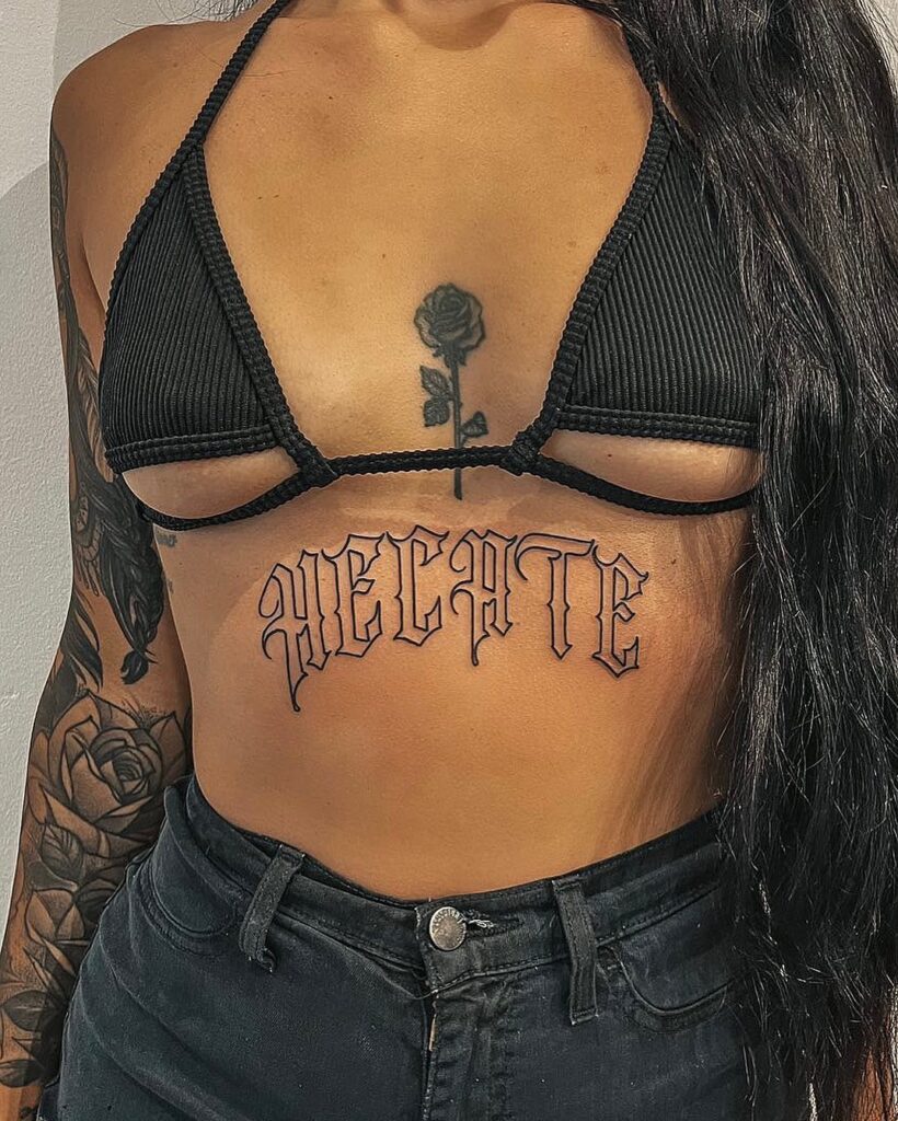 Hecate black rose sternum tattoo meaning and inspiration