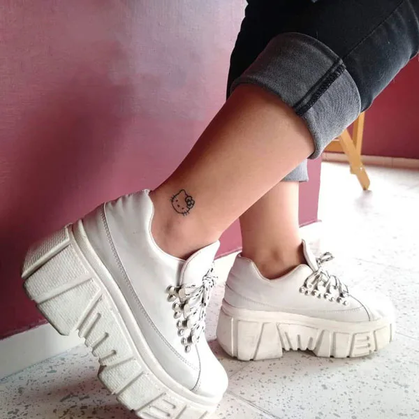 Hello kitty ankle tattoo