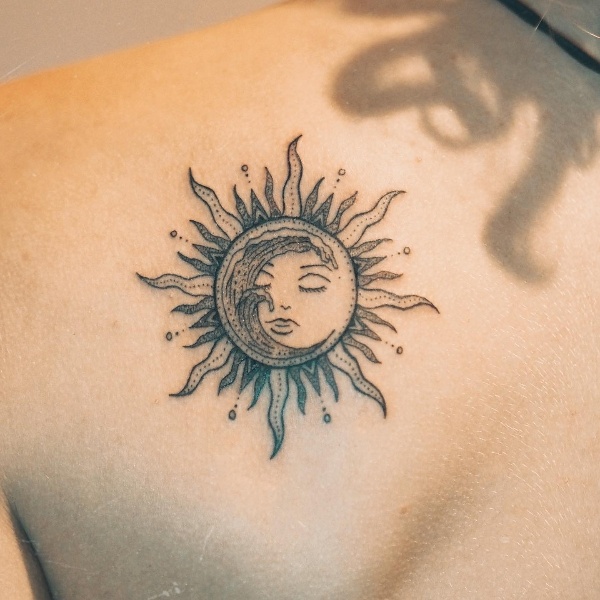 Human Face Inside the Sun and Wave Tattoo for Back