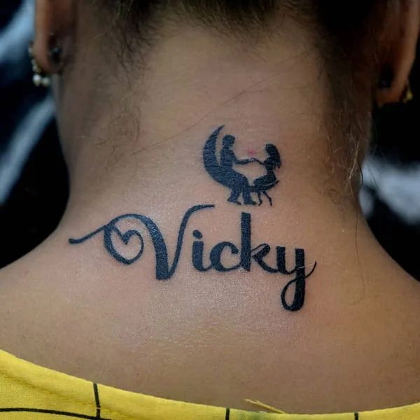 Husband name tattoo