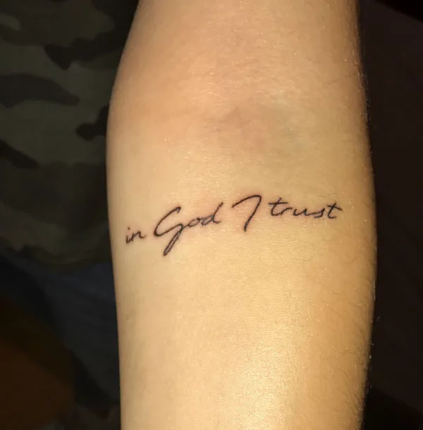 In god I trust tattoo female