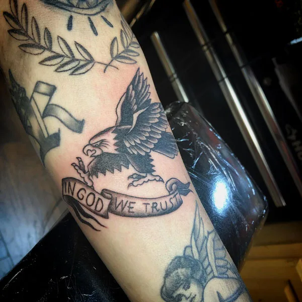 In god we trust traditional tattoo