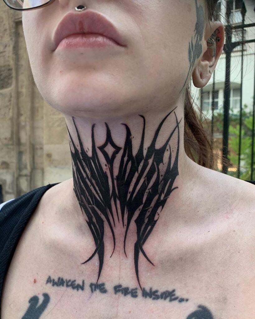 Ink that speaks dark lettering tattoos for the female neck