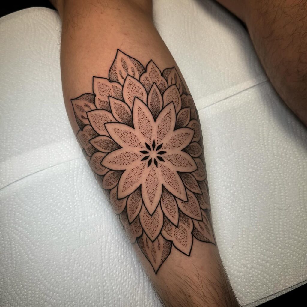 Intricate Mandala Tattoo Gracing the Calf: Mandala Marvel 