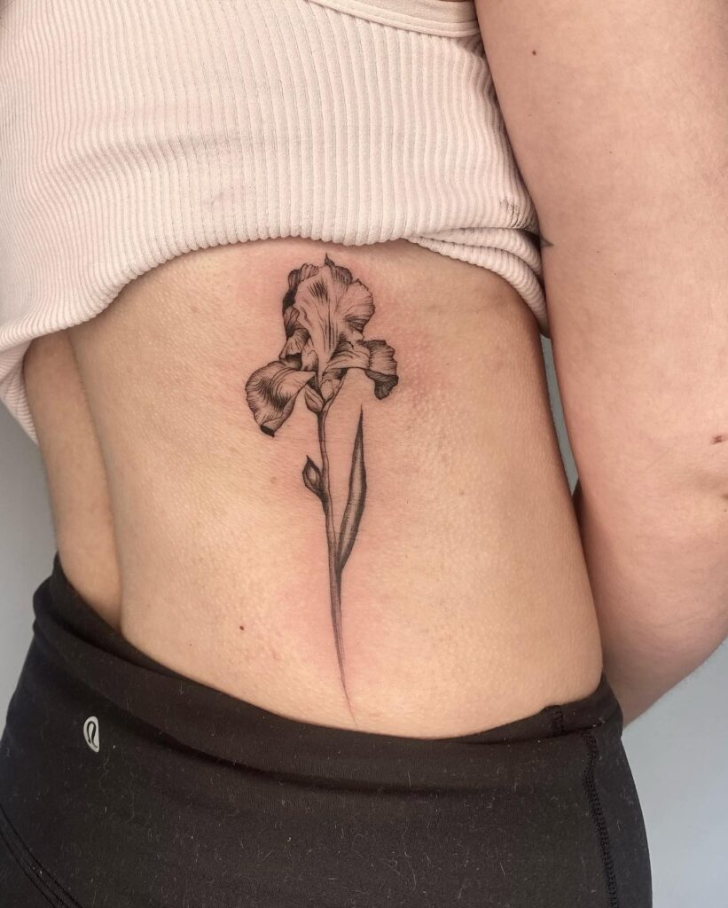 Iris Flower Tattoo on the Side of the Lower Back: Iris Whispers