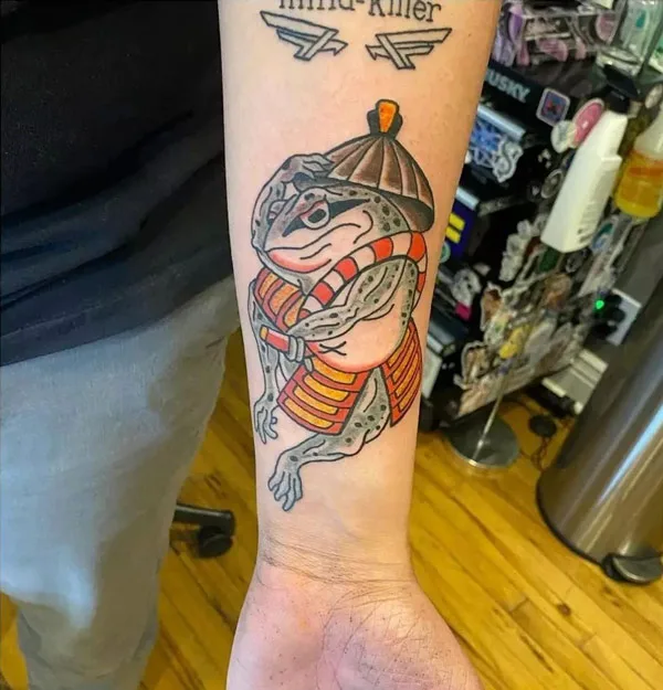 Japanese frog tattoo on forearm