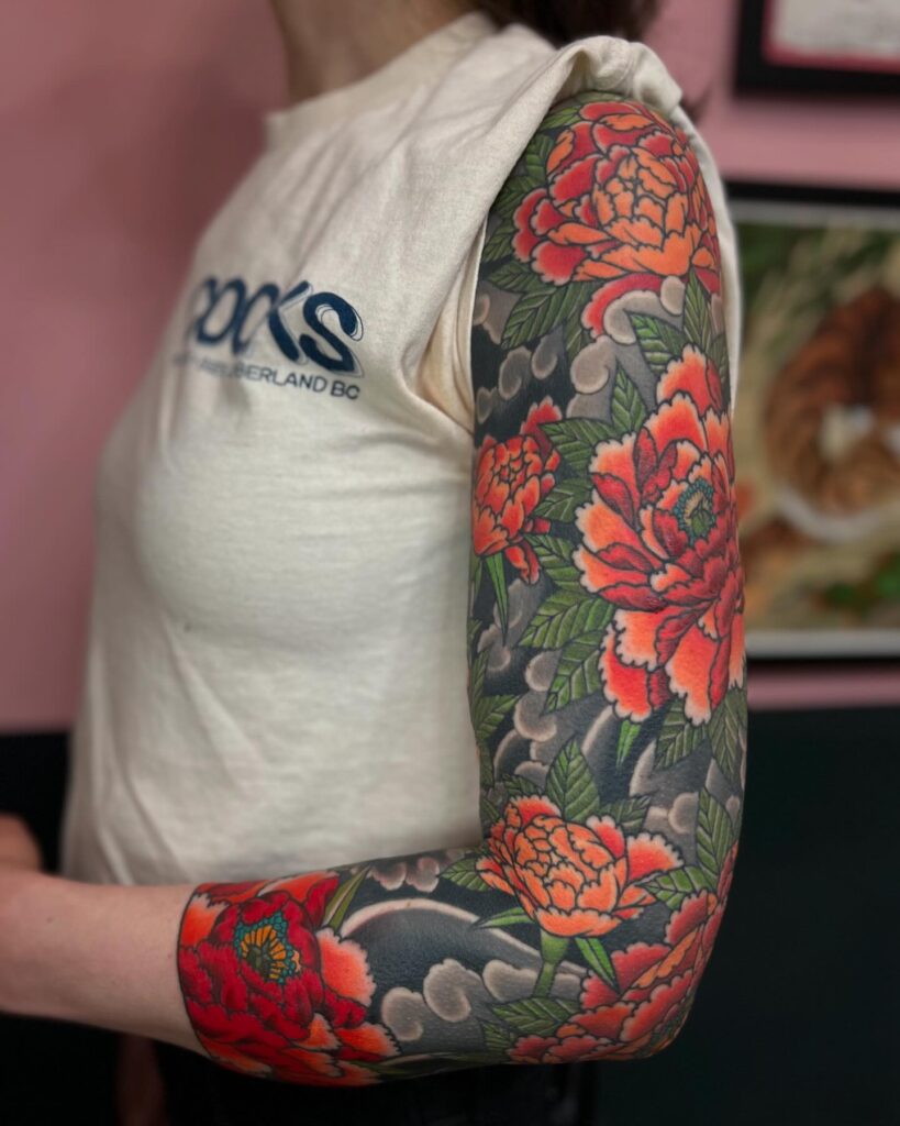 Japanese-Style Tattoo Sleeve with Peonies and Traditional Wind Elements