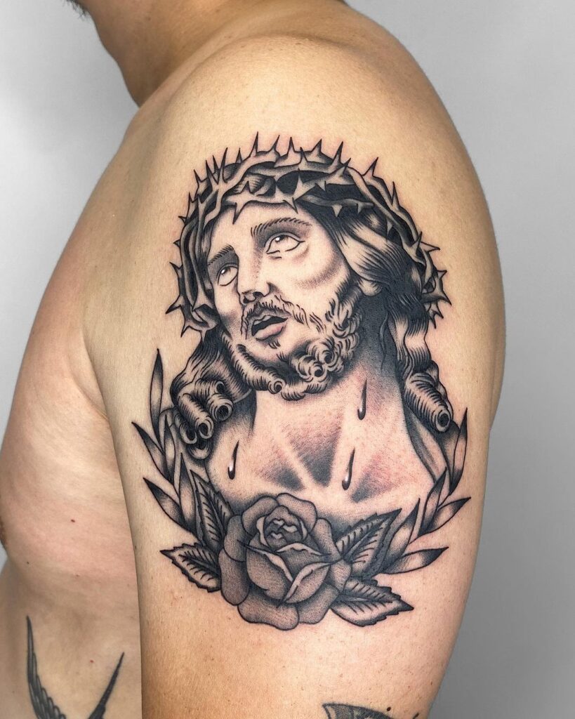 Jesus portrait blackwork tattoo men's arm art
