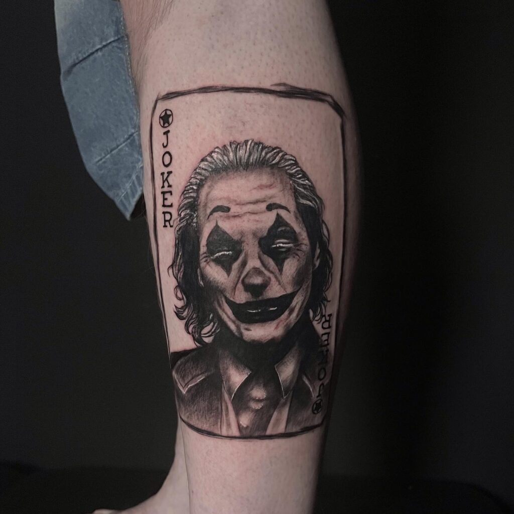 Joker Face Tattoo on Leg Side Male: Daring and Expressive Tattoo Design