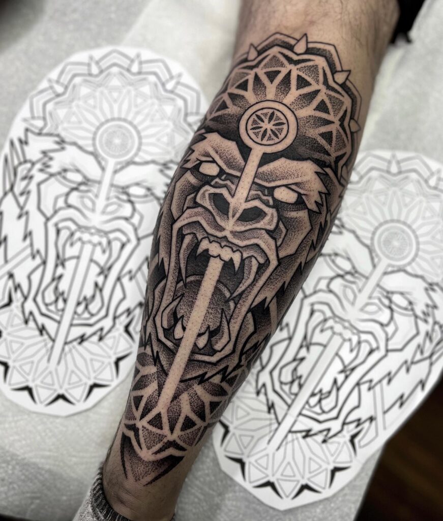 Juicy Gorilla Mandala Tattoo, Artfully Displayed on the Calf in Blackwork: Gorilla Mandala
