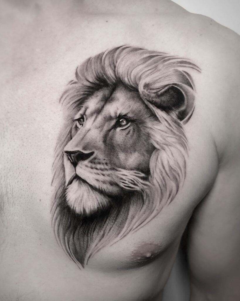 King lion head tattoo on the chest, capturing the loyalty and majesty of this loyal beast loyal monarch