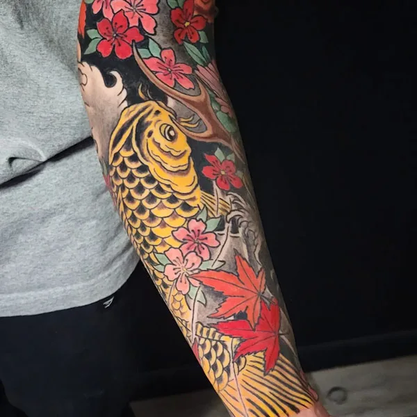 Koi fish cover up tattoo