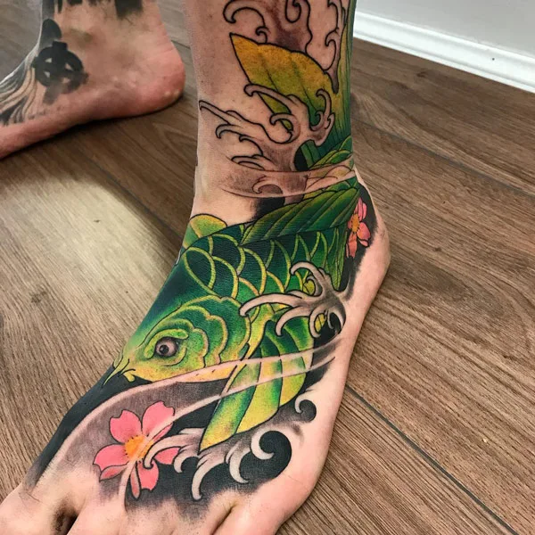 Koi fish foot tattoo
