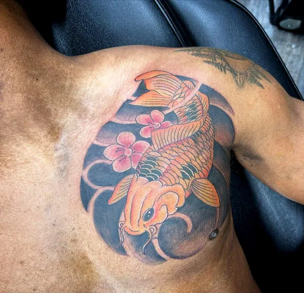 Koi fish tattoo on chest