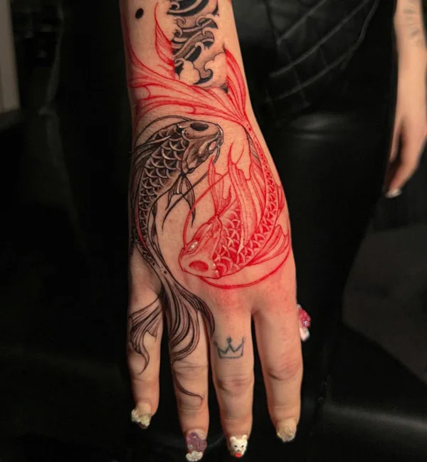 Koi fish tattoo on hand