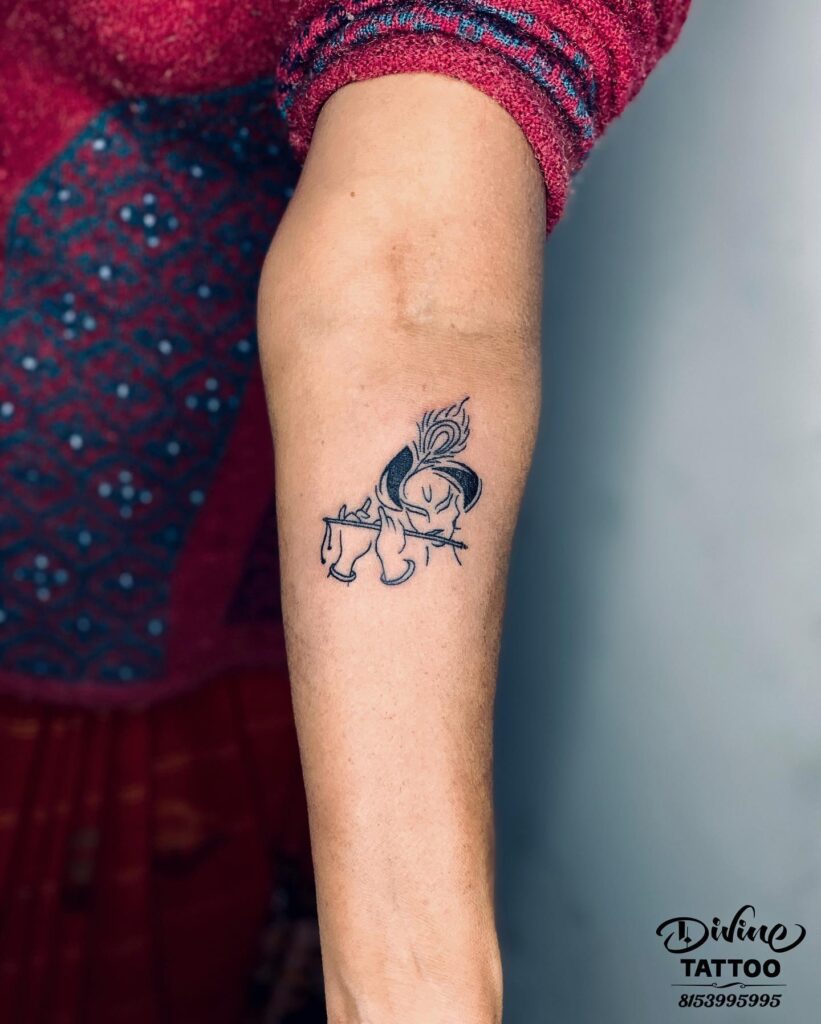 Krishna in serenity a beautiful floating tattoo for the forearm