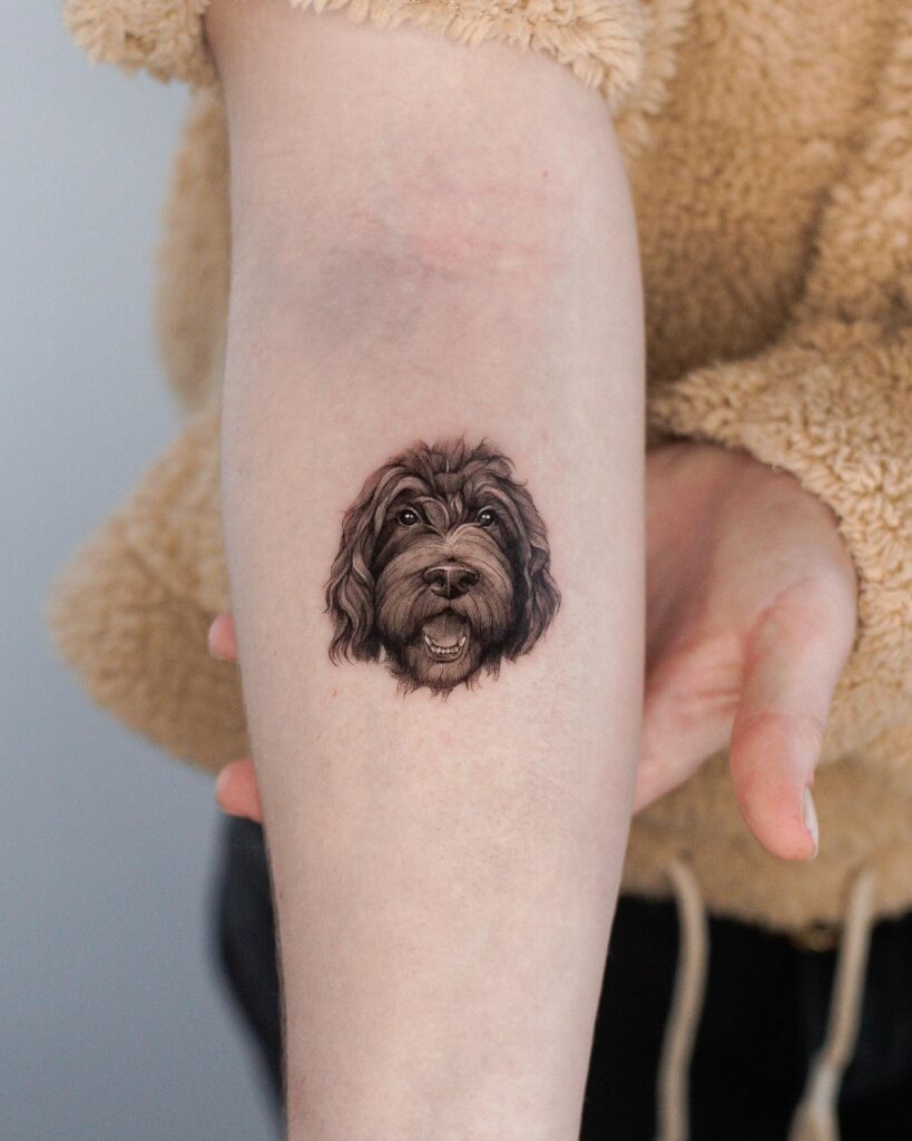 Labradoodle Portrait Tattoo on the Forearm with a Cute Face: Adorable Doodle