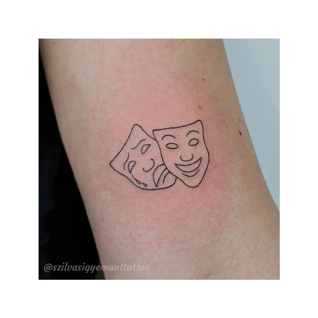 Laugh Now Cry Later Design Above the Elbow: A Striking Placement