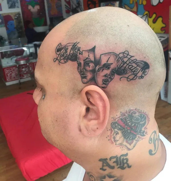 Laugh now cry later head tattoo
