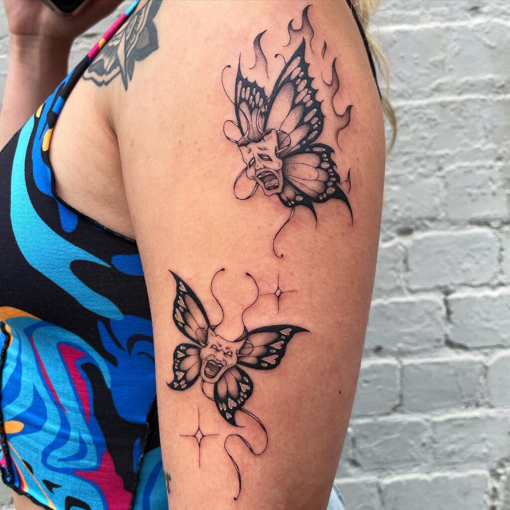 Laugh Now Cry Later Masks of Emotion on Upper Arm: Butterflies and North Stars 
