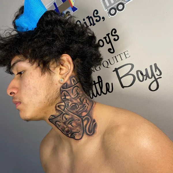 Laugh now cry later neck tattoo