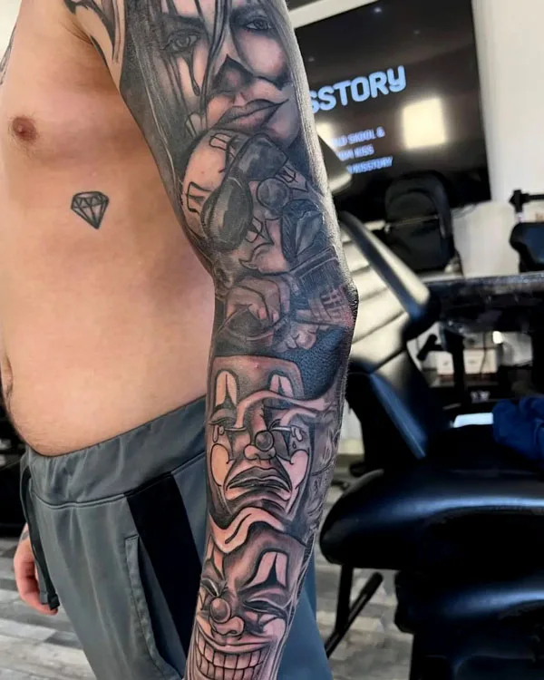 Laugh now cry later sleeve tattoo