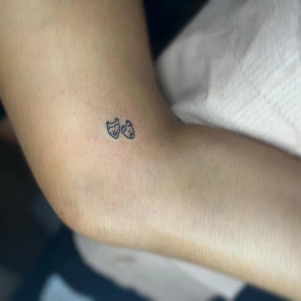 Laugh now cry later small tattoo