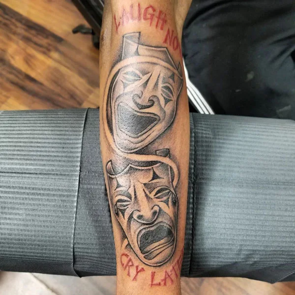 Laugh now cry later tattoo 50
