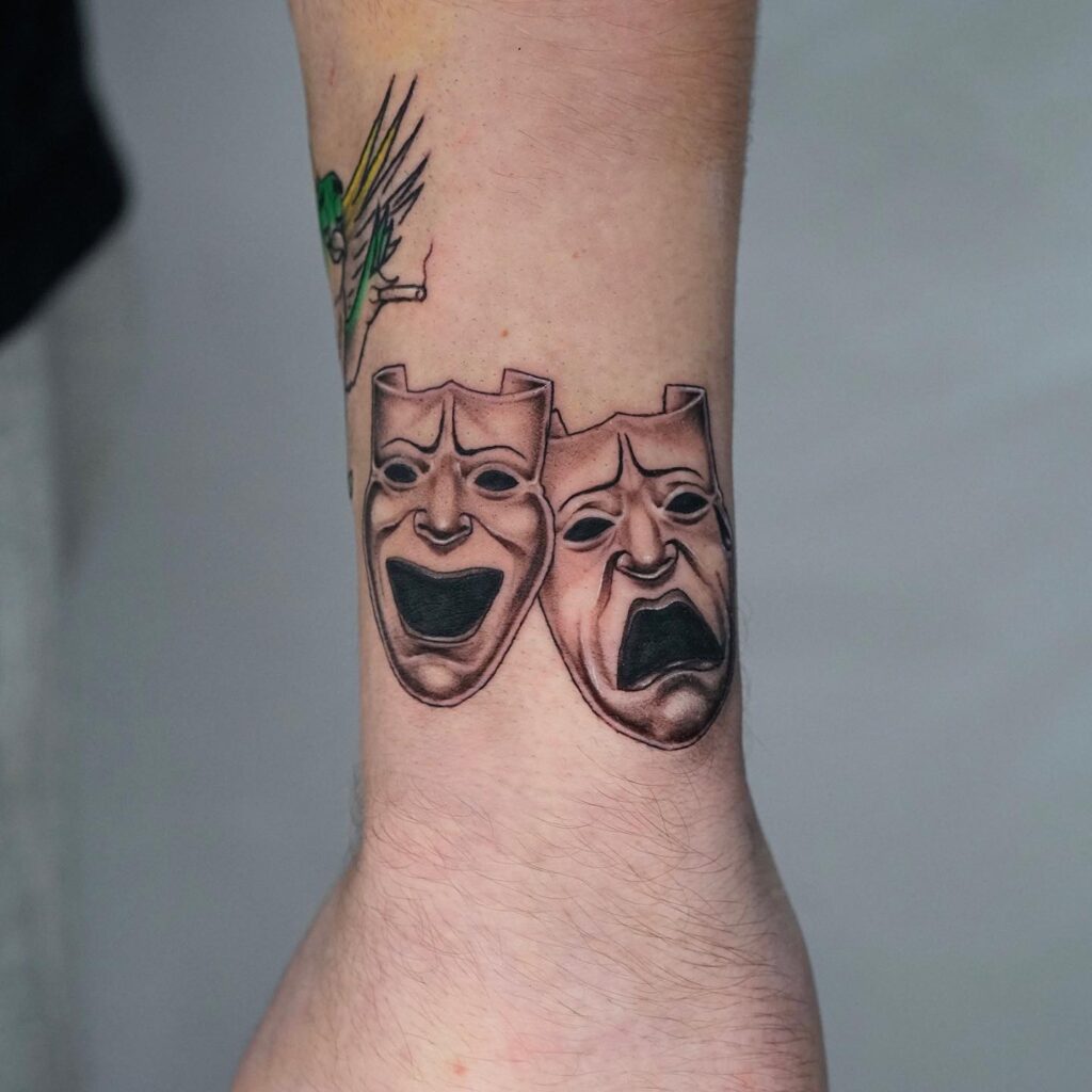 Laugh now cry later tattoo outer wrist placement  stylish and symbolic 