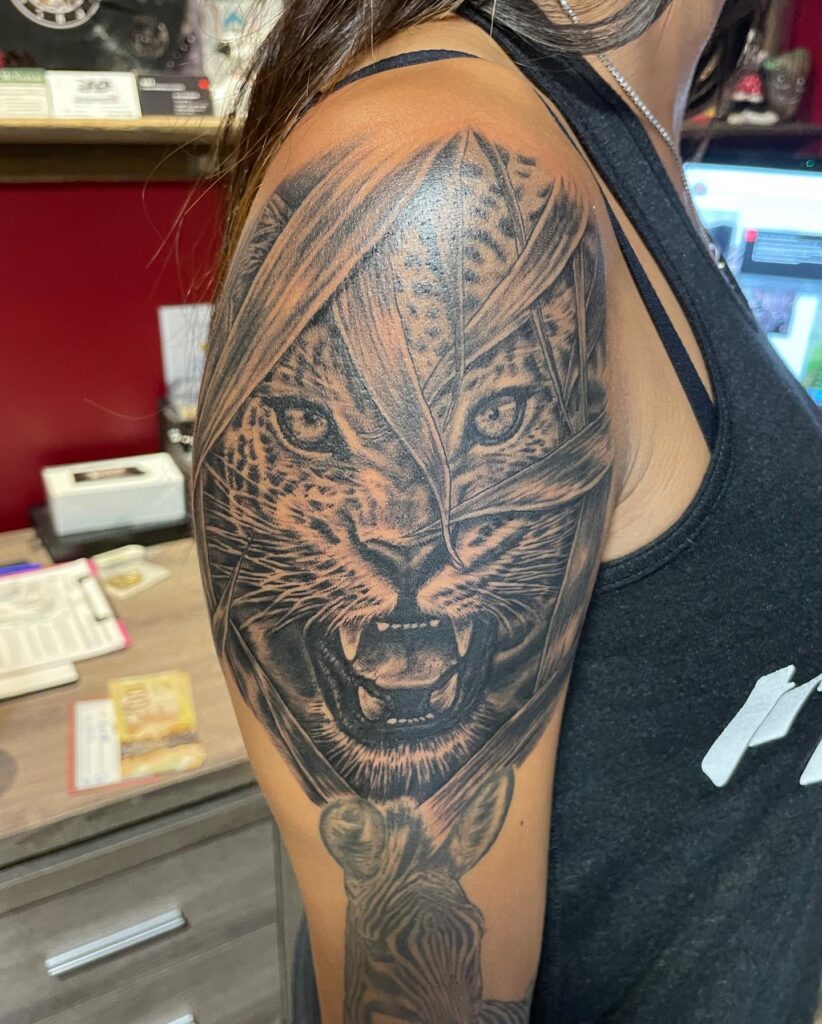 Leopard angry face tattoo half sleeve fierce feline fury