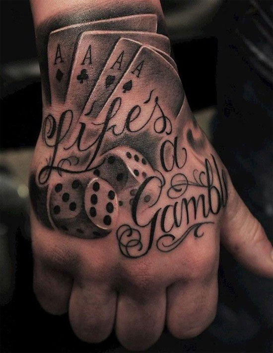 Life a gamble tattoo on hand