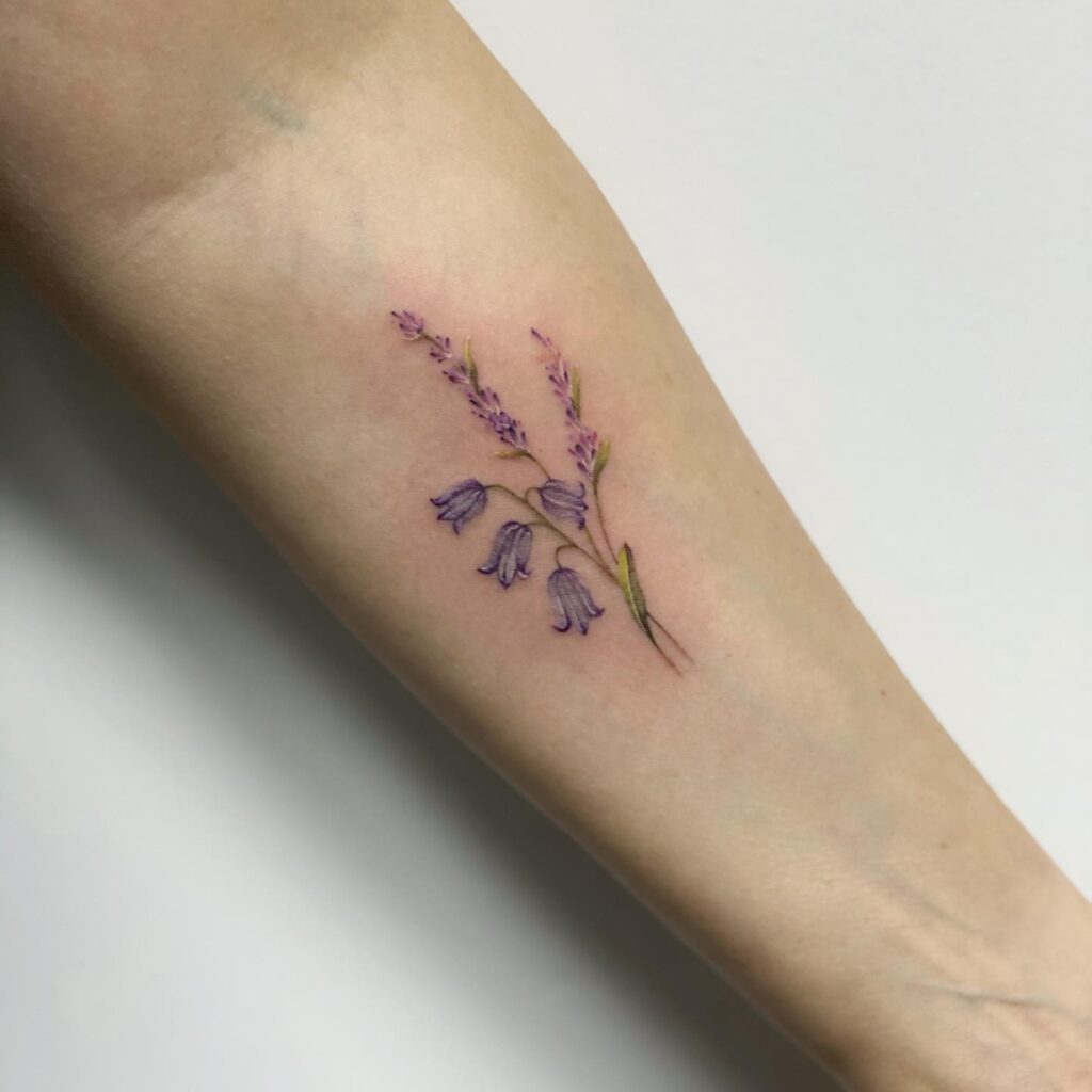 Lightly Colored and Detailed Bluebell Tattoo on the Forearm: Lavender Grace