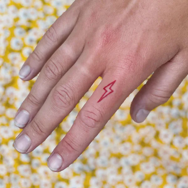 Lightning bolt finger tattoo 1
