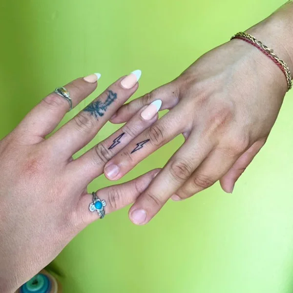 Lightning bolt finger tattoo 2