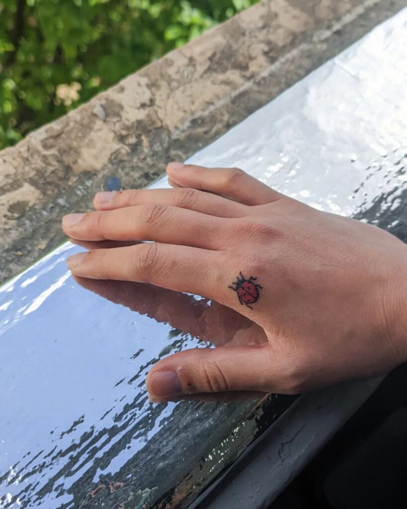 Lil Ladybug Tattoo Near Index Finger A Secret Symbol of Luck