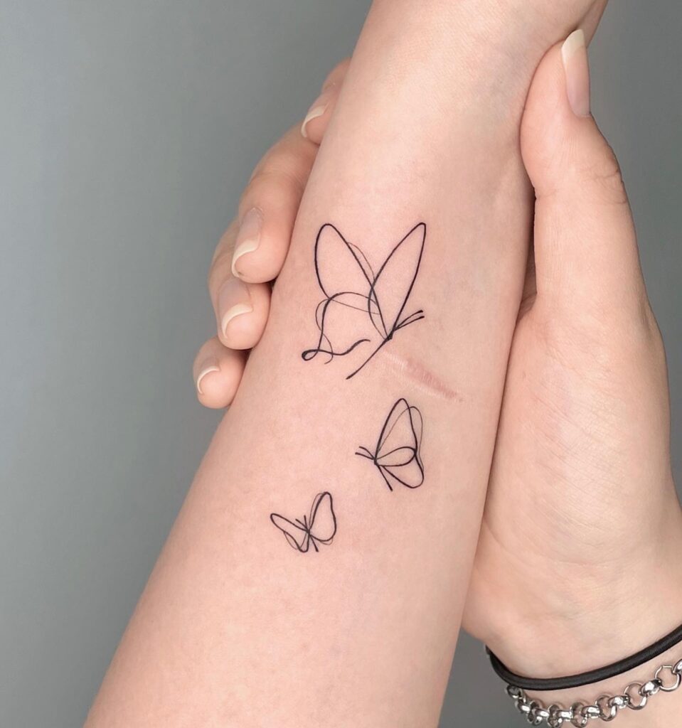 Line Art Minimalist Butterfly Forearm Tattoo