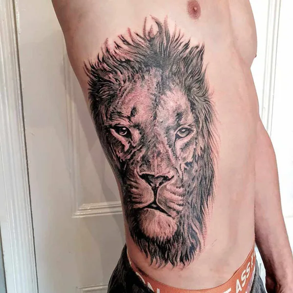 Lion Rib Tattoo