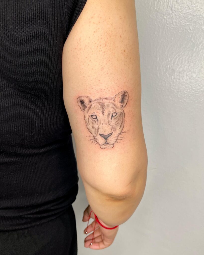 Lioness Portrait Tattoo on the Back of the Above the Elbow: Fierce Motherhood