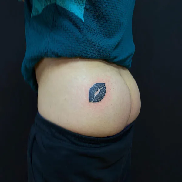 Lips tattoo on butt