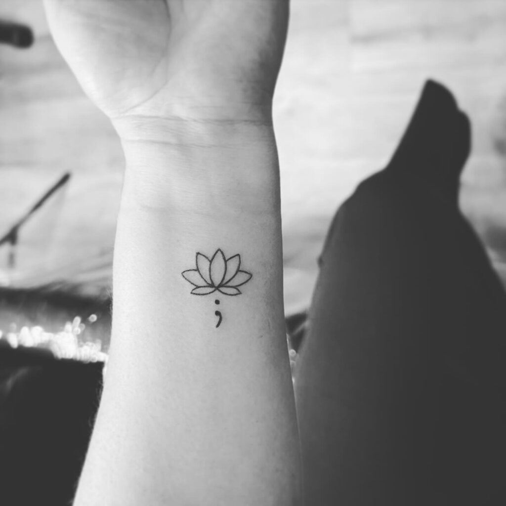 Little Lotus Flower with Semicolon Tattoo on the Inner Wrist: Lotus Bloom