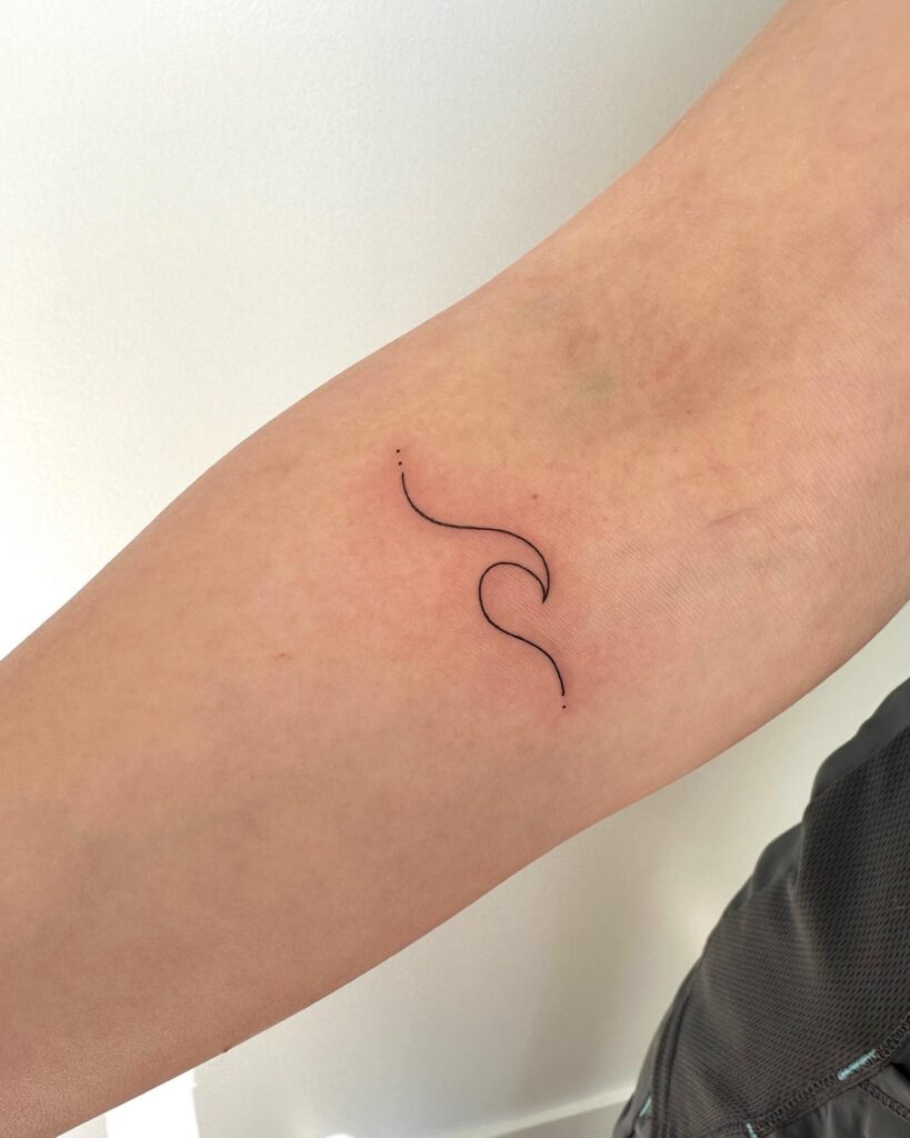 Little Minimalistic Wave Tattoo Below the Elbow: Seaside Serenity