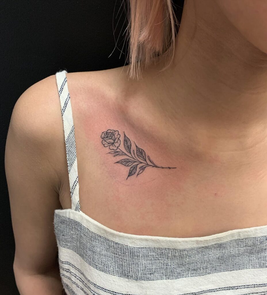 Little rose plant tattoo on the collarbone for a dainty and elegant look rosy delight