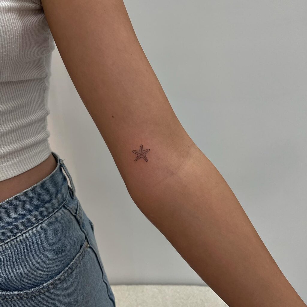 Little Starfish Tattoo Above the Elbow: Oceanic Whimsy
