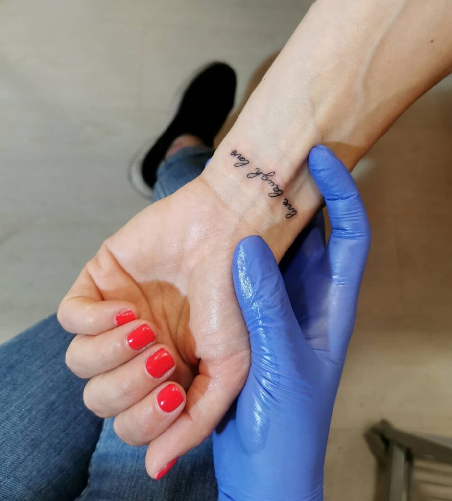 Live Laugh Love Tattoo on the Inner Wrist in a Minimalist Style: Minimal Bliss