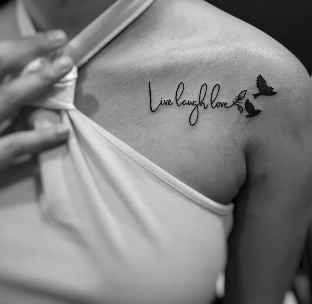 Live Laugh Love Text with Birds on Arm and Shoulder: Harmony and Flight