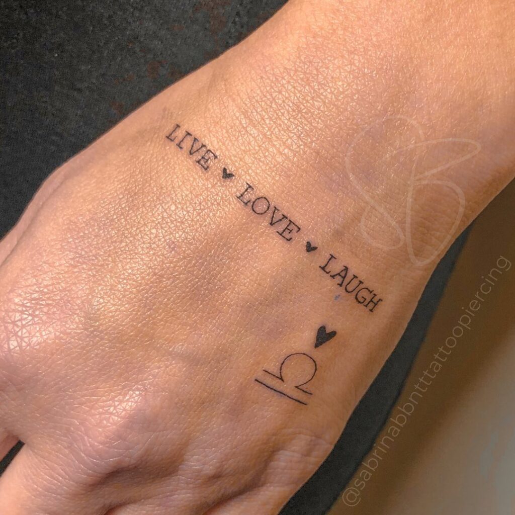 Live love laugh on the top of the hand