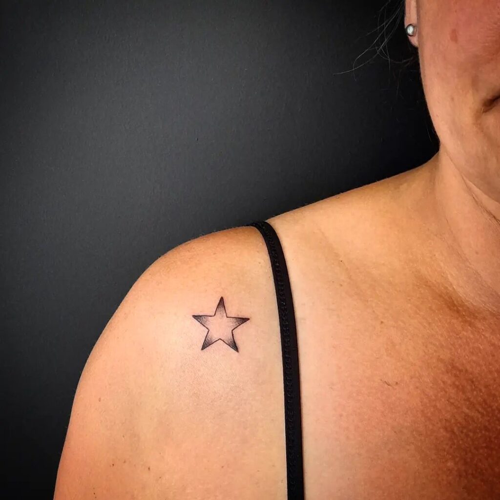 Lone star elegance single star shoulder tattoo for females