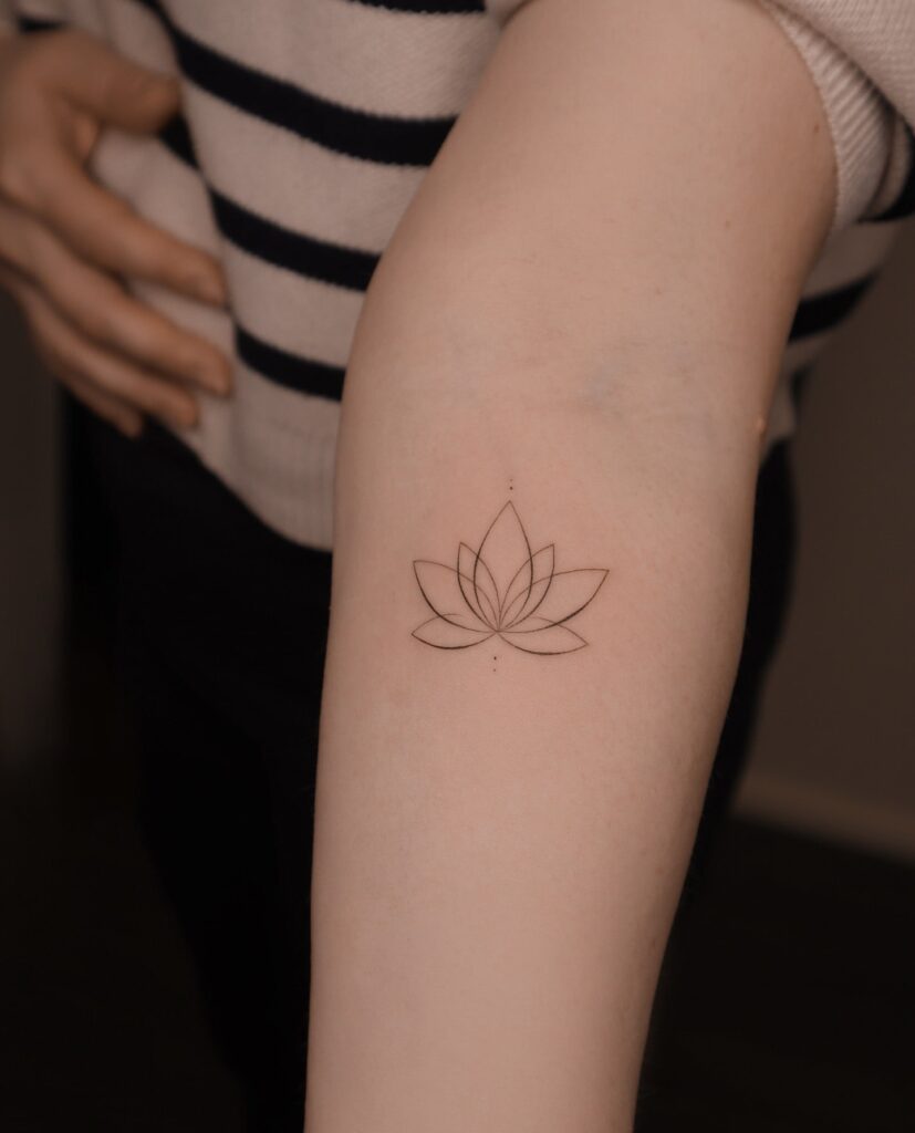 Lotus Flower Tattoo Bringing Grace to the Forearm: Geometric Harmony